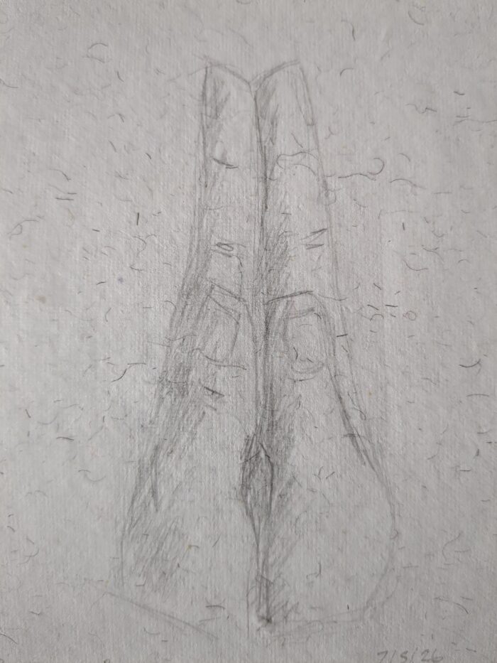 A pencil sketch on rough hairy paper of two hands pressed together as in prayer.